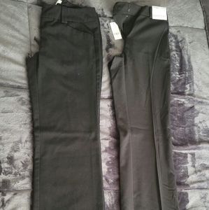 Two pairs of black dress pants, size 0